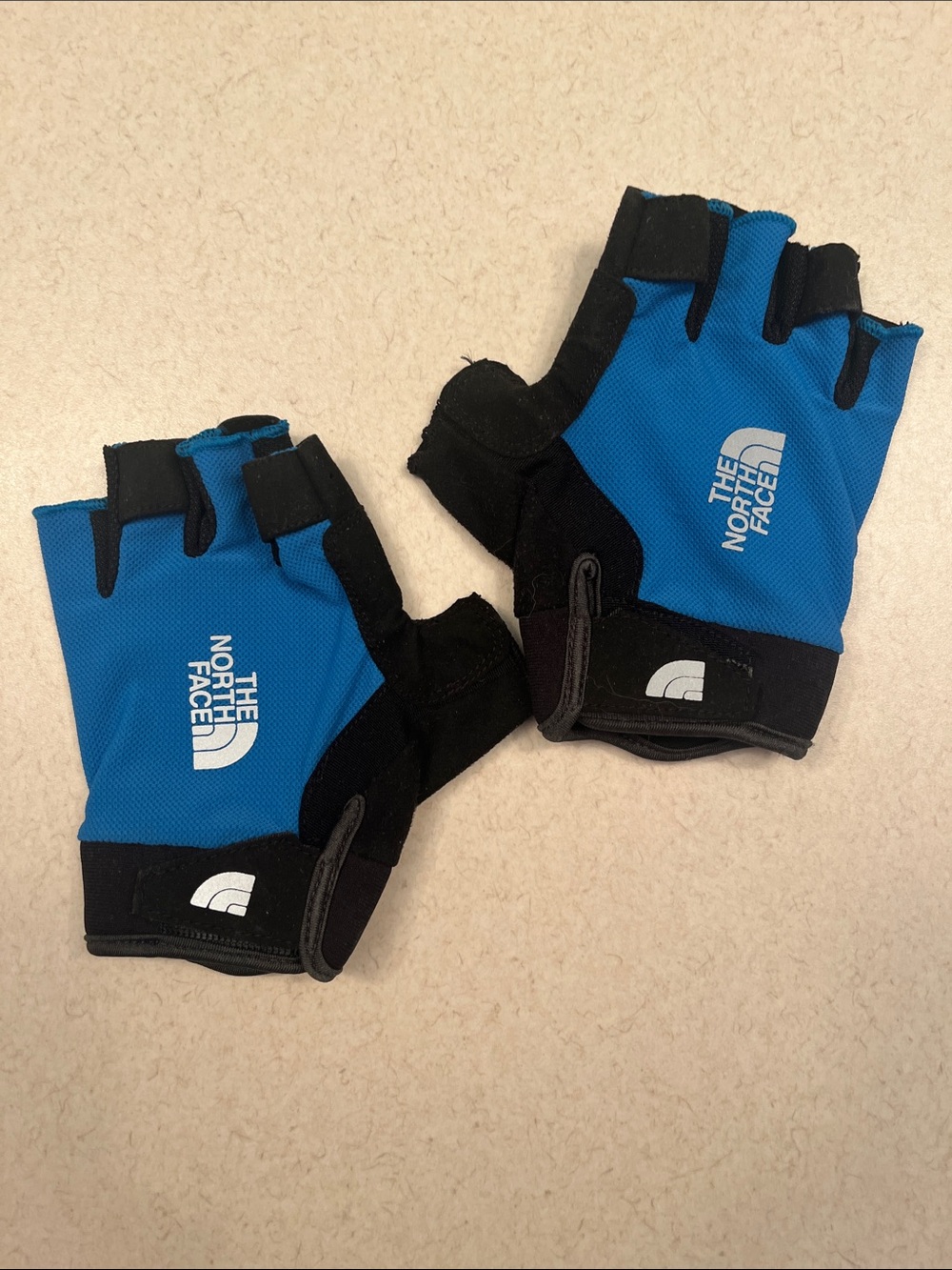 The North Face Blue and Black Fingerless Cycling Gloves